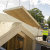 A photo of a SIPs roof panel being craned onto a build frame